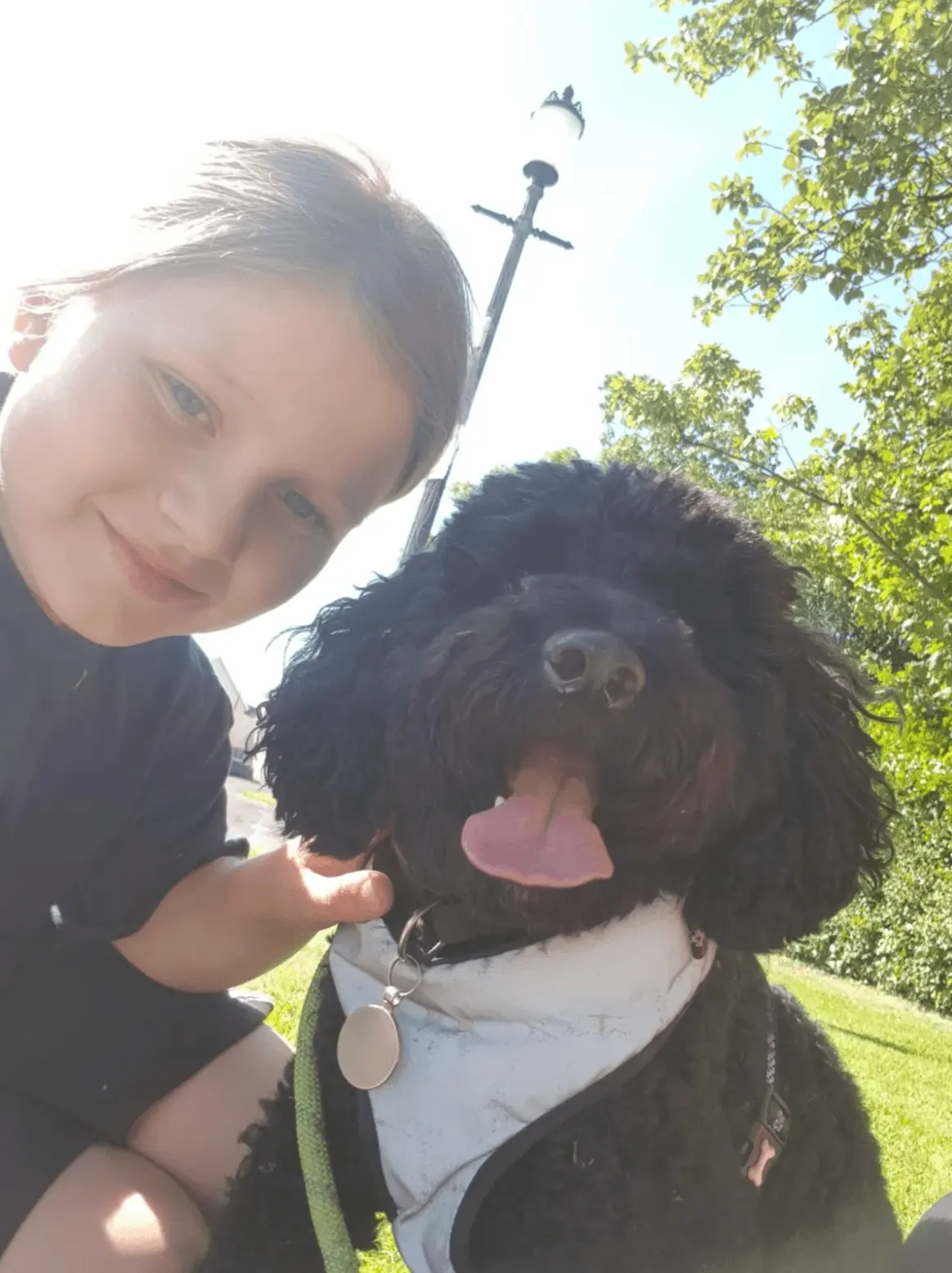 Child connecting with dog in session